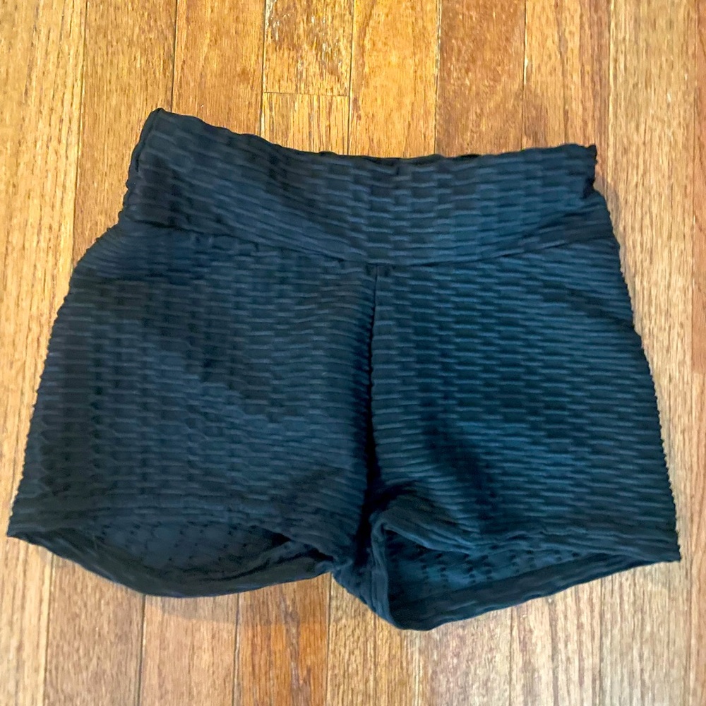 Size S spandex with a textured design.